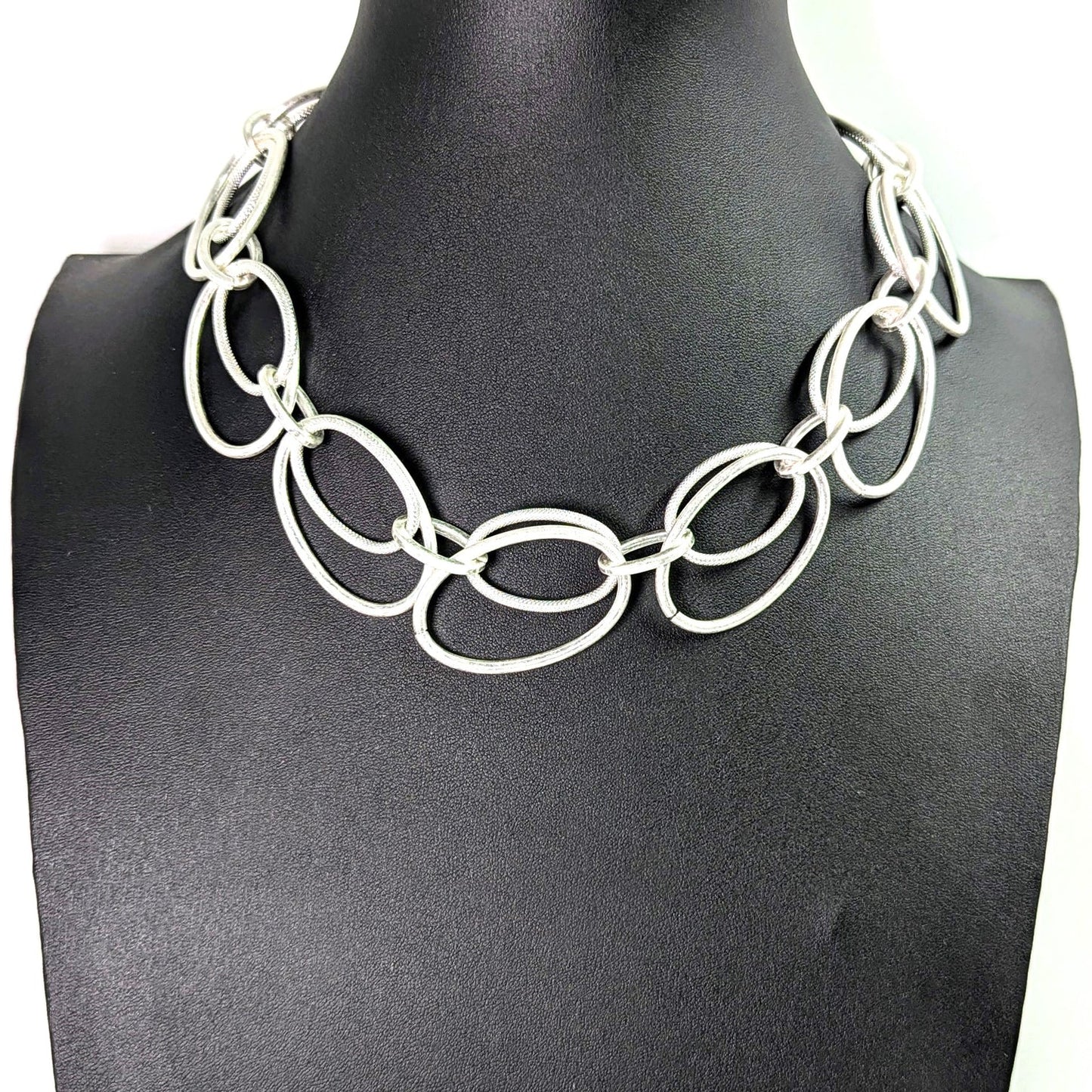 Oval links necklace with smooth and mottled texture
