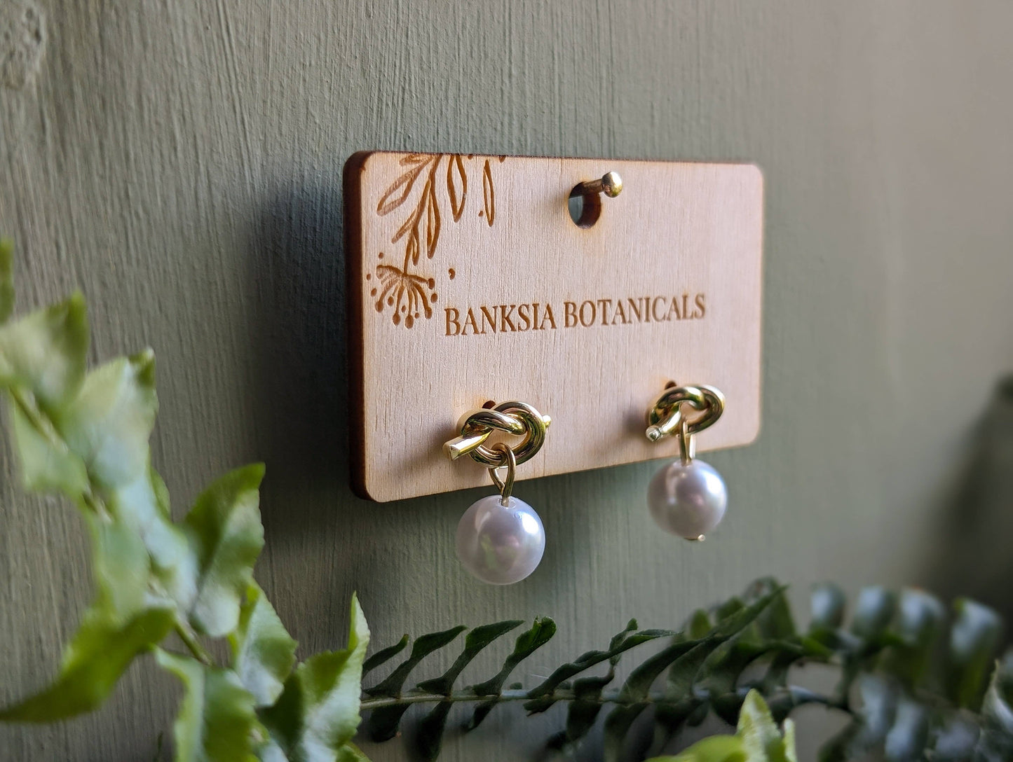 Gold Faux Pearl Knot Stud Earrings